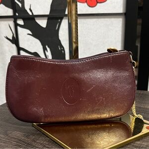 Cartier Vintage Elegant Burgundy Leather Wristlet with Gold Chain Strap